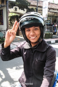 Balinese Man On Motorcycle Photo